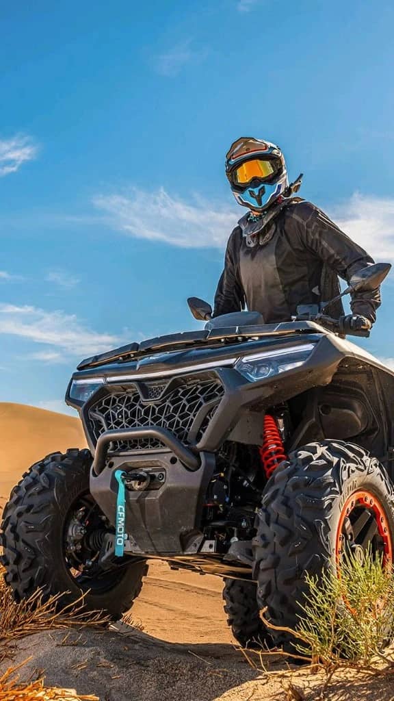 Rider on a CFMOTO quad in the desert near Essaouira